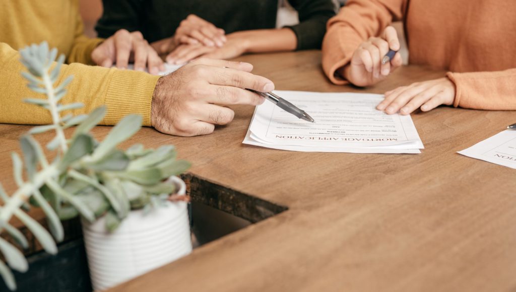 Loan officer providing clients with expectations for the closing process