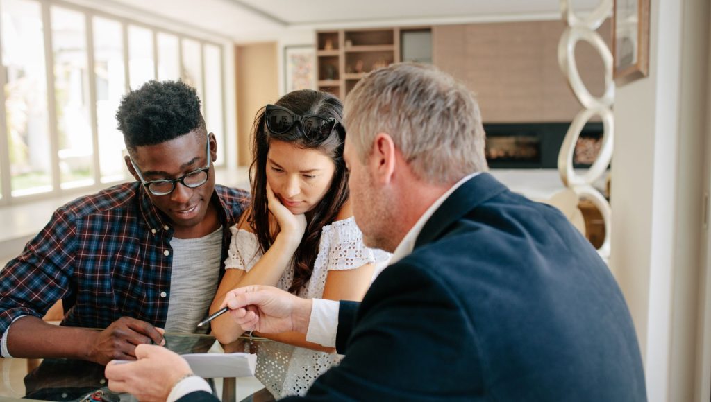 Clients reviewing their loan options with our expert mortgage specialists